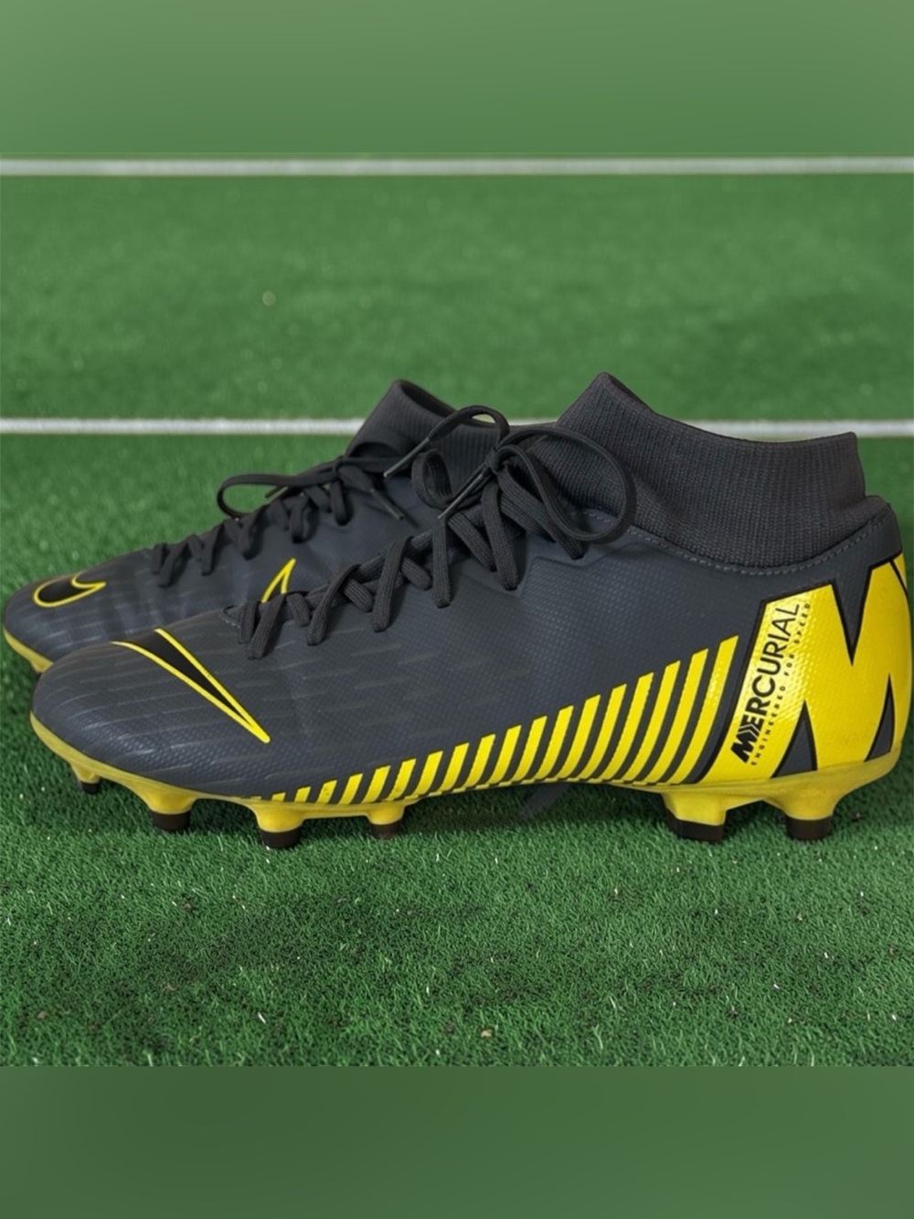 Nike Men’s Black Soccer Cleats with Yellow Swoosh